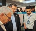 بازدید معاون فرهنگی و اجتماعی وزارت عتف از غرفۀ نمایشگاهی دانشگاه علامه طباطبائی در افتتاحیۀ جشنوارۀ ملی «برهان»